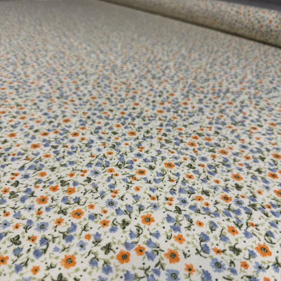 Gofre Kumaş Küçük Çiçek Desenli Emprime  Mavi Turuncu Çiçek