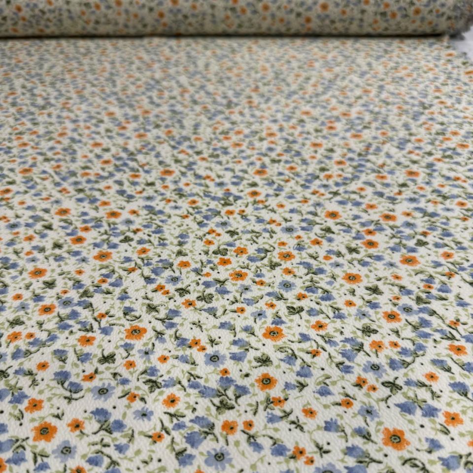 Gofre Kumaş Küçük Çiçek Desenli Emprime  Mavi Turuncu Çiçek